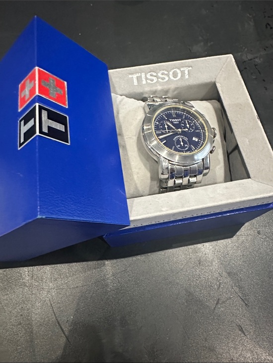 Tissot Other - Tissot Silver Watch with Blue Dial and Stainless Bracelet